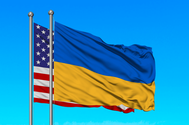 U.S. and Ukrainian flags flying side by side, symbolizing solidarity and support between the two nations during the Russo-Ukrainian War.