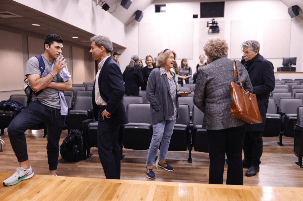 Attendees discuss populism in America with panelists at Tocqueville Center event.