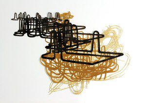 "Full Flow" by Kathleen Thum. Motor oil and carbon black on laser cut paper.