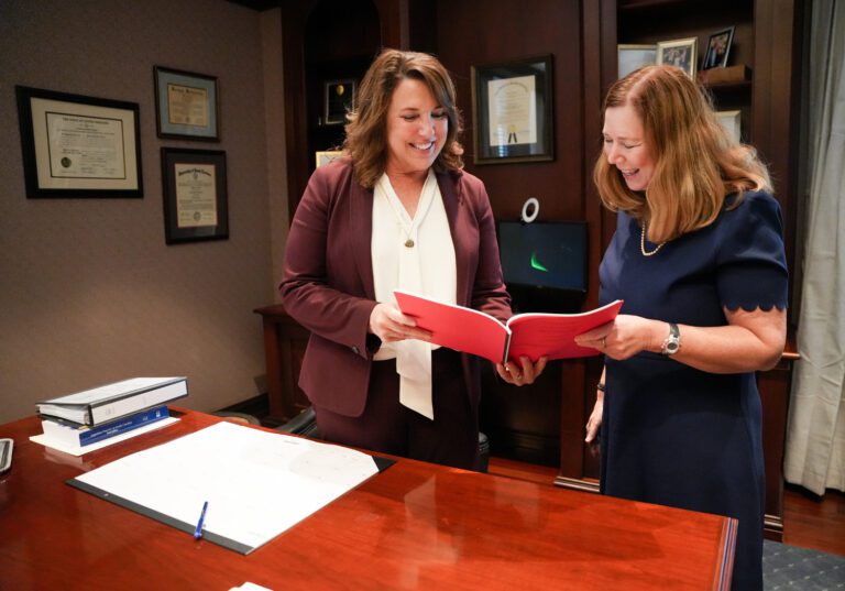 Justice Letitia Verdin ’92 talks with her clerk Jen Madsen ’92 in her office at the South Carolina Supreme Courthouse in Columbia, SC