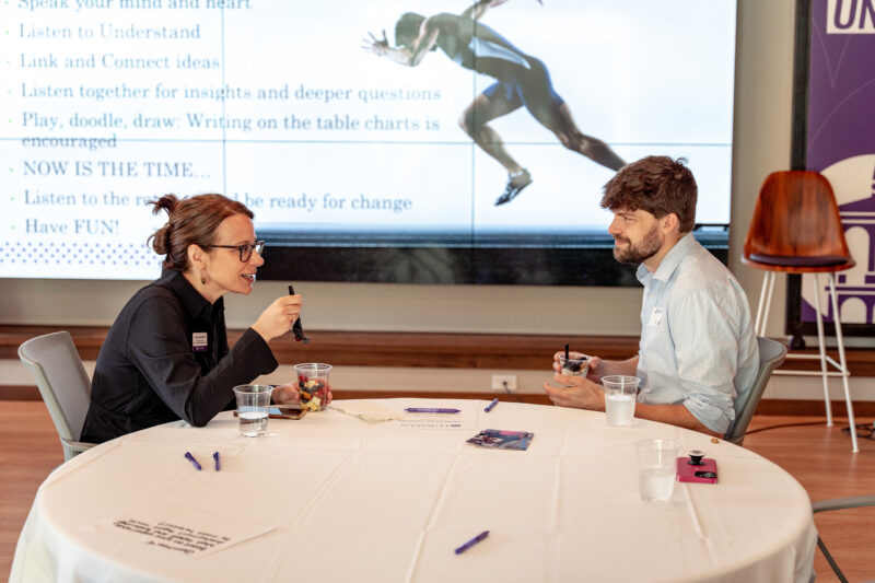 Two people discussing