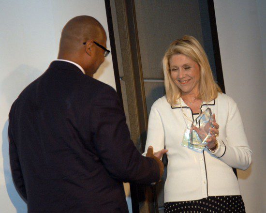 Jane Comfort presenting an award to Juan Johnson