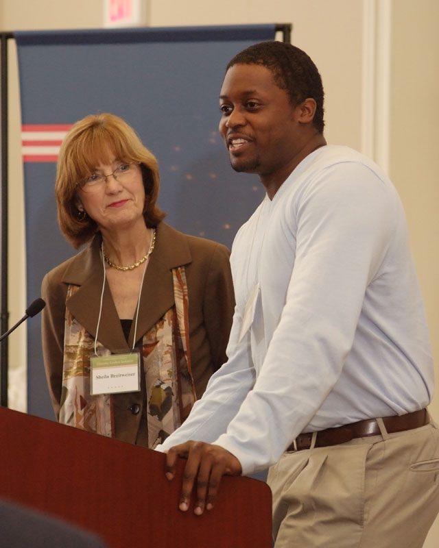 Sheila Breitweiser and Rich Winley, members of The Talented Tenth project group, delivering their presentation