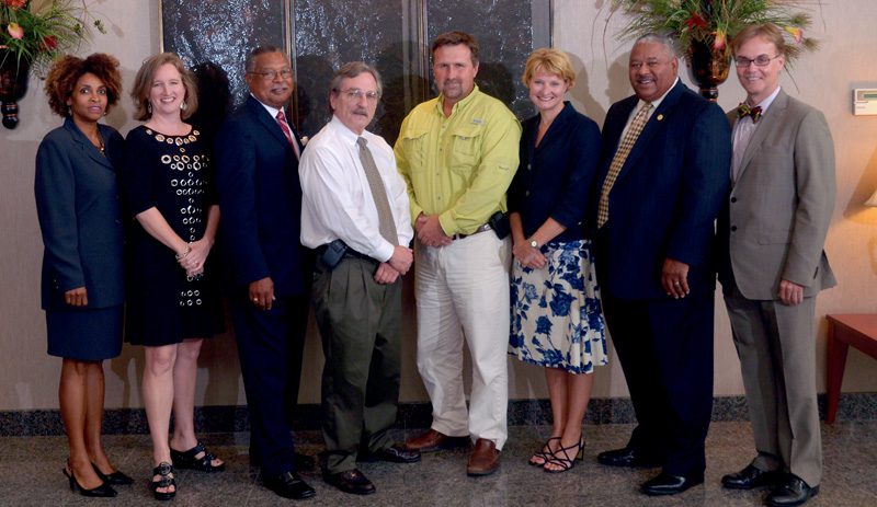 Baby Seeds Literacy Program: (l-r) Minuette Floyd, Elise Partin, William Johnson, Tom Dandridge, Brice McKoy, Amy Kovach, Steve Wilson and Jan Harper