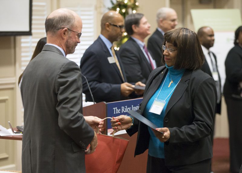 Barbara Wilson, accepting her certificate, is now a Riley Fellow