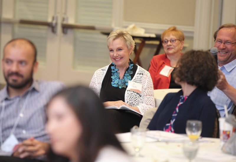 Nan Dempsey listens to the presentations.