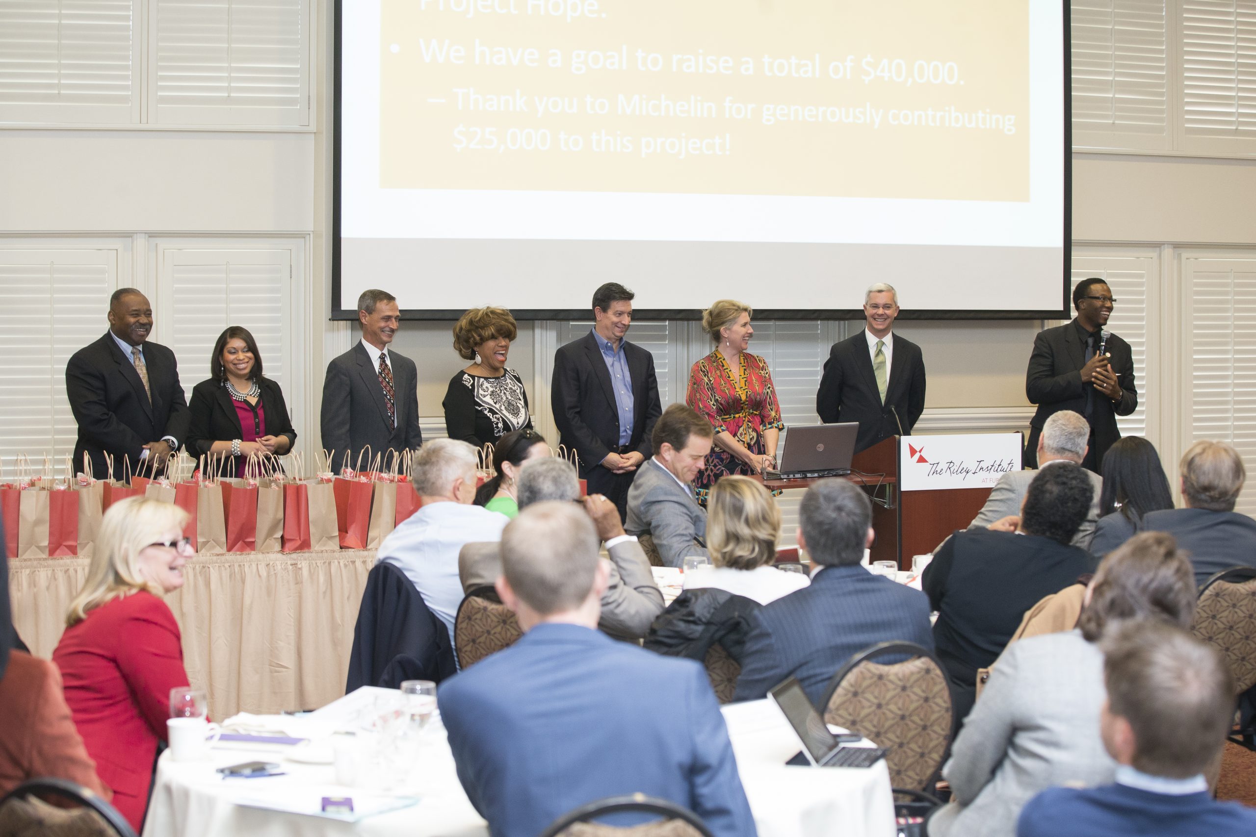 Team All In (l-r): Alonzo Thompson, Asha McMillian, Neal Urch, Kathy Rivers, Vic Koelsch, Carey Rothschild, Troy Hanna and James White