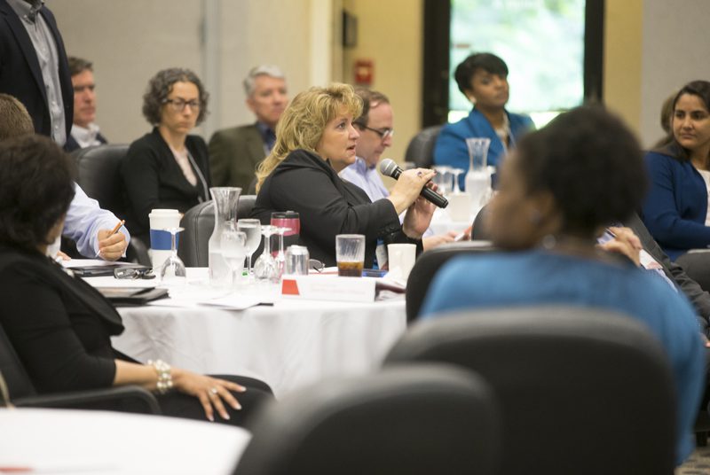 Tricia Richardson, Team PASSION, Poverty Awareness – Simulating Struggles in Our Neighborhoods, asking the team a question
