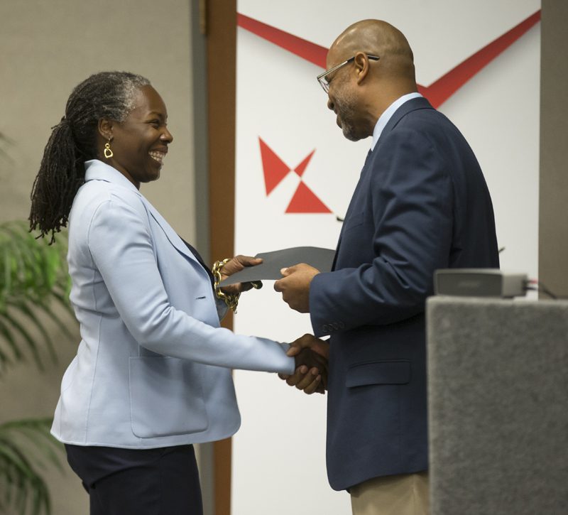 Isvara Wilson, Team Homegrown, receiving her Riley Fellow certificate