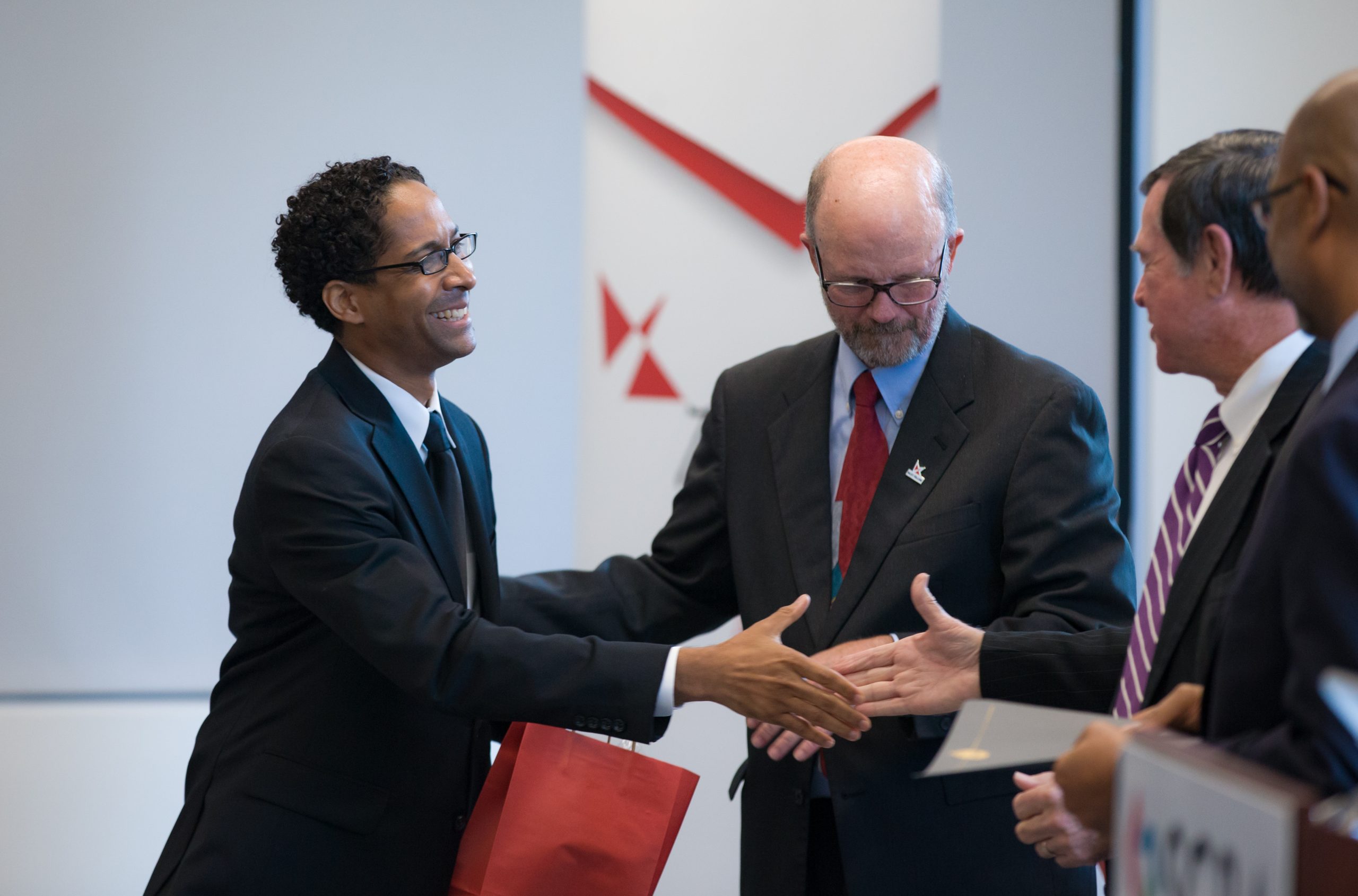 Andŕe Boyd, College & Career for Cougars, receiving his Riley Fellow certificate