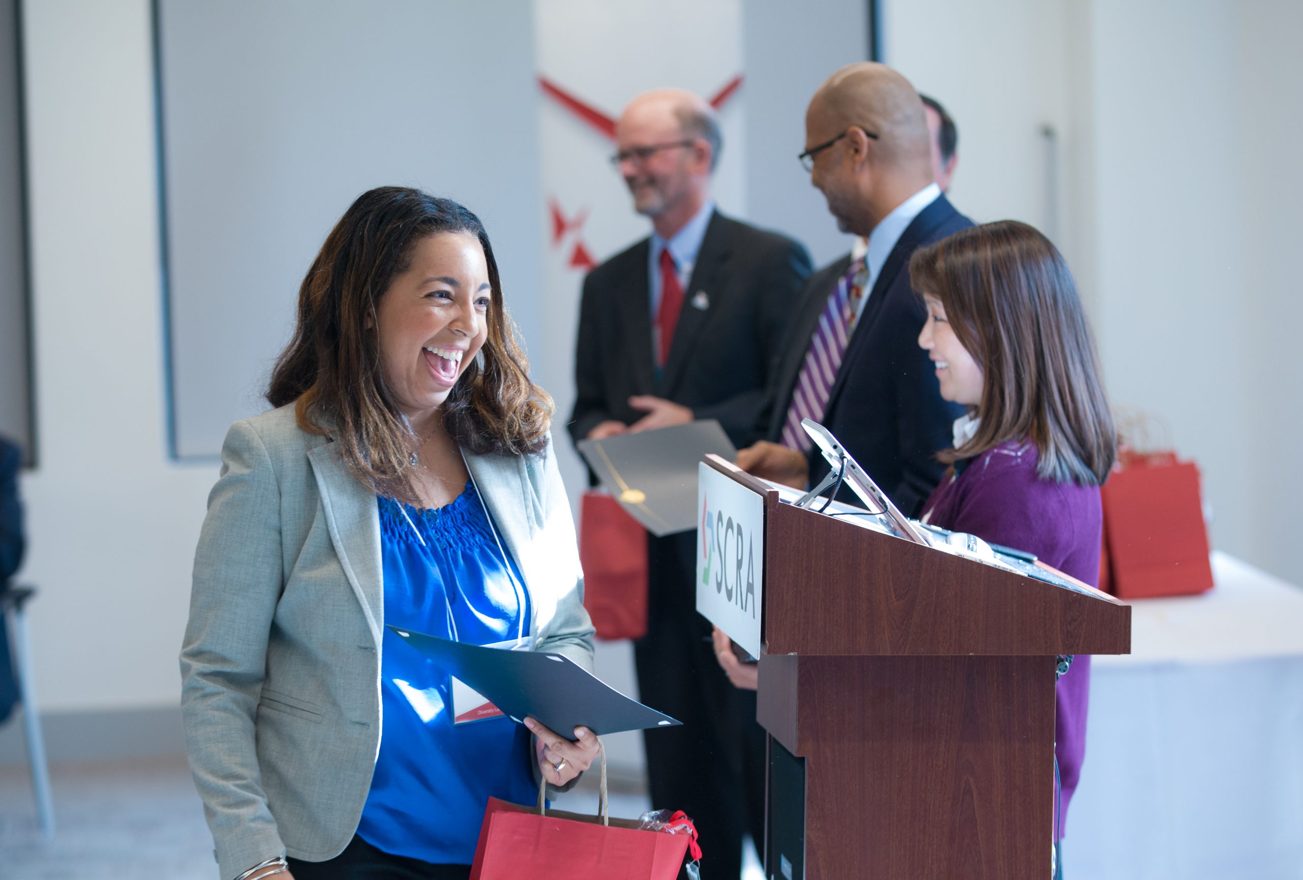 Courtney Howard, Lunch with Deputies, receiving her Riley Fellow certificate