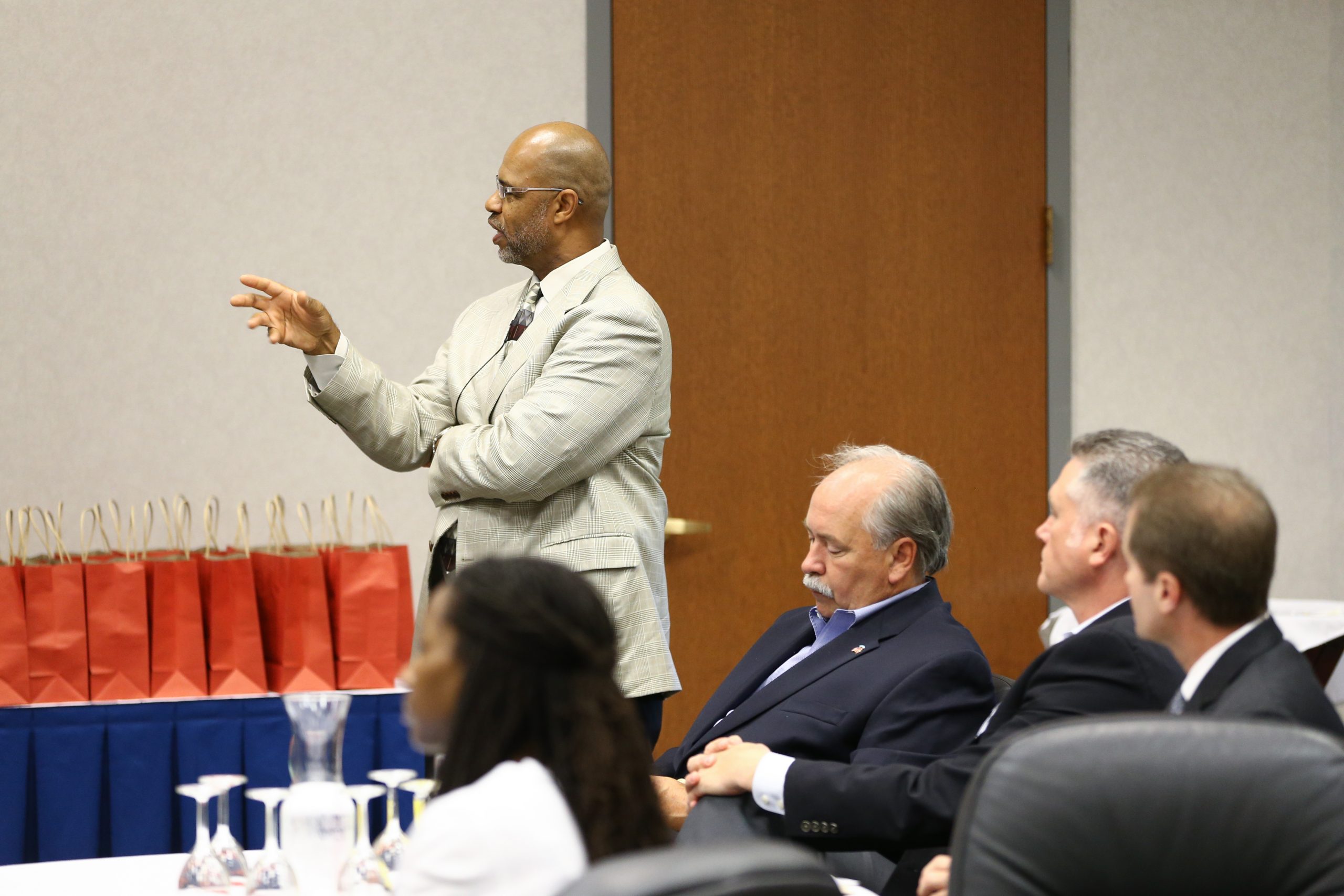 Juan Johnson posing a question to the team