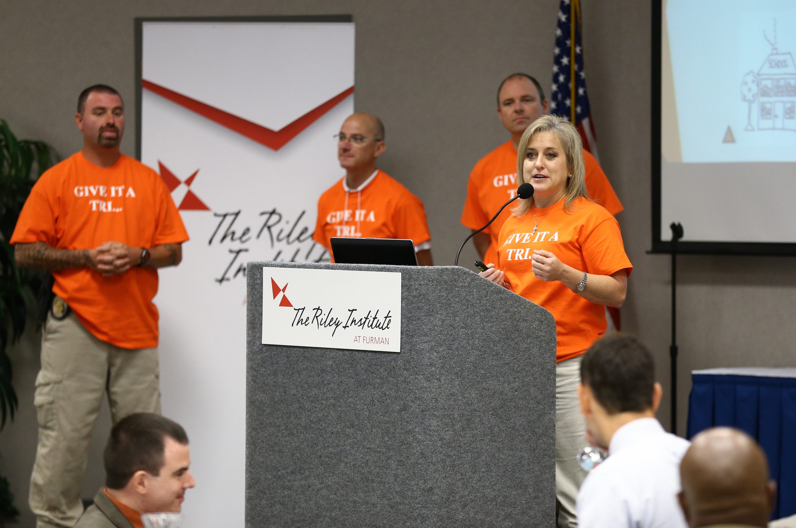 Kelli Farmer speaking, Greenville: Give it a Tri