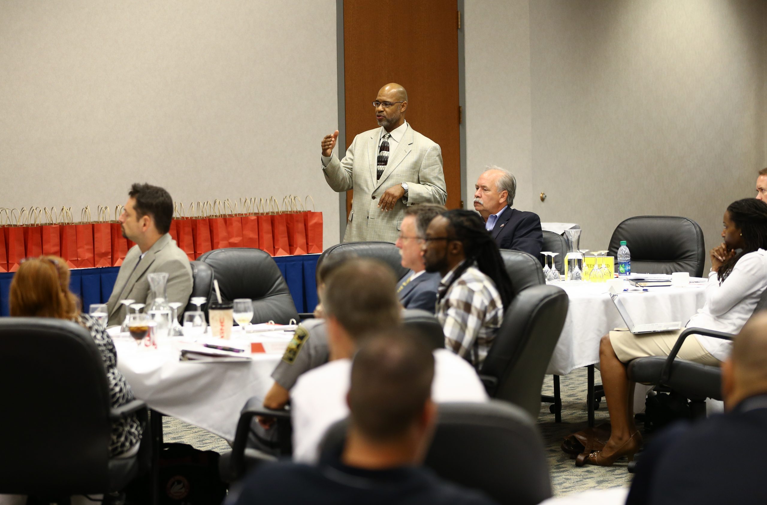 Juan Johnson posing questions to the team