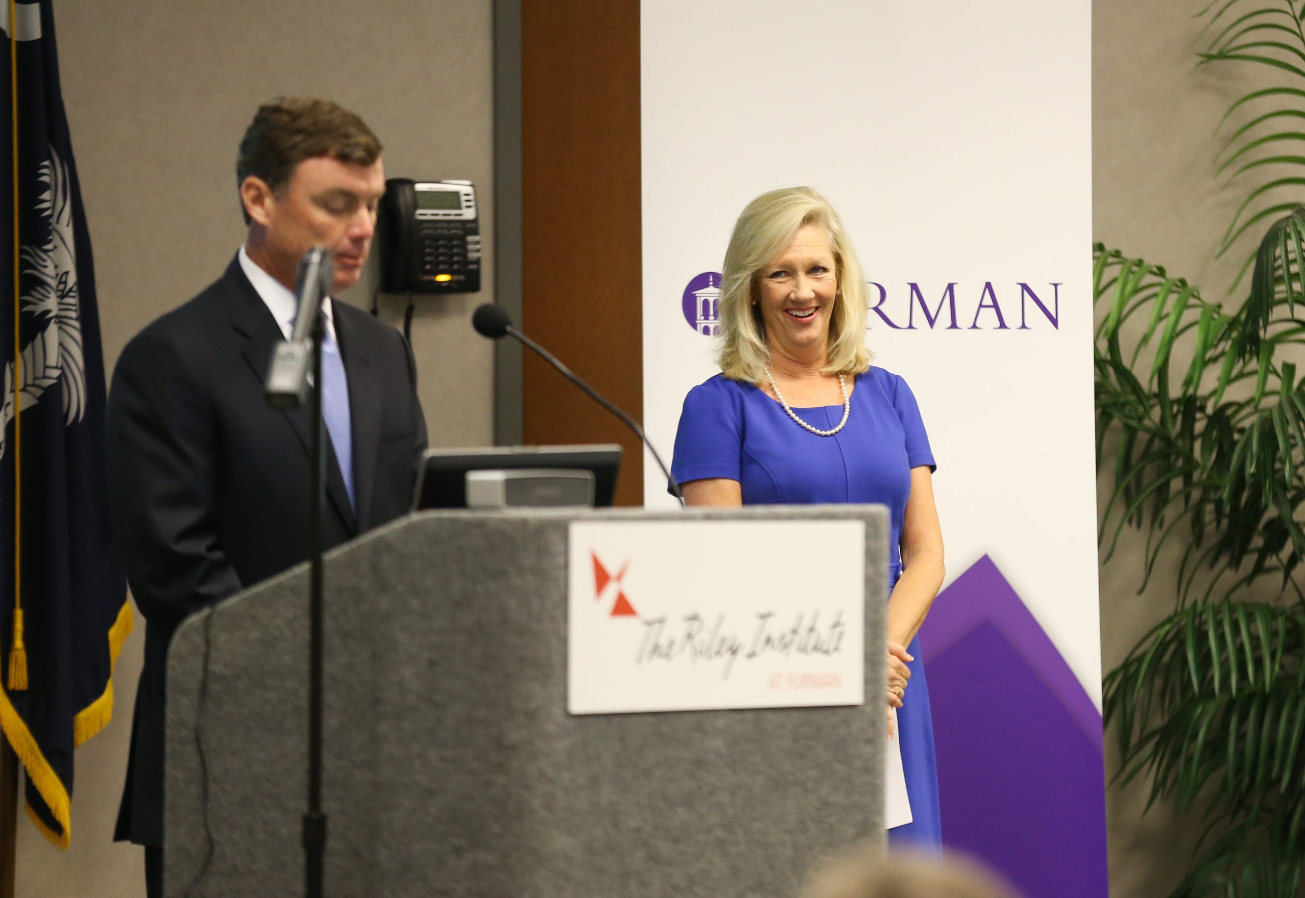 Bryan Stirling speaking and Laurie Parks, A Mother's Voice