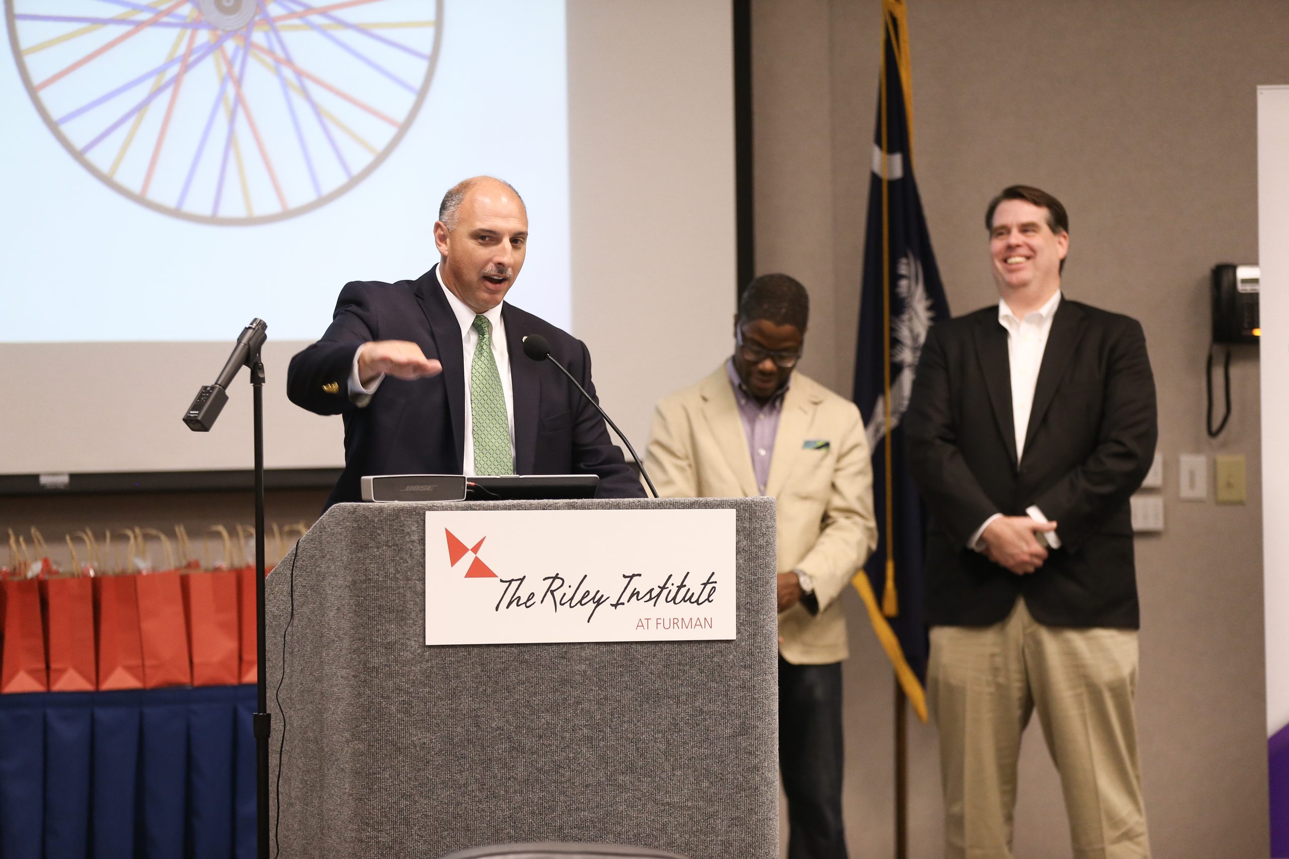 Skip Holbrook, speaking, and (l-r) Sherard Duvall and Randy Lowell, Spokes and Wheels: Connecting the Dots