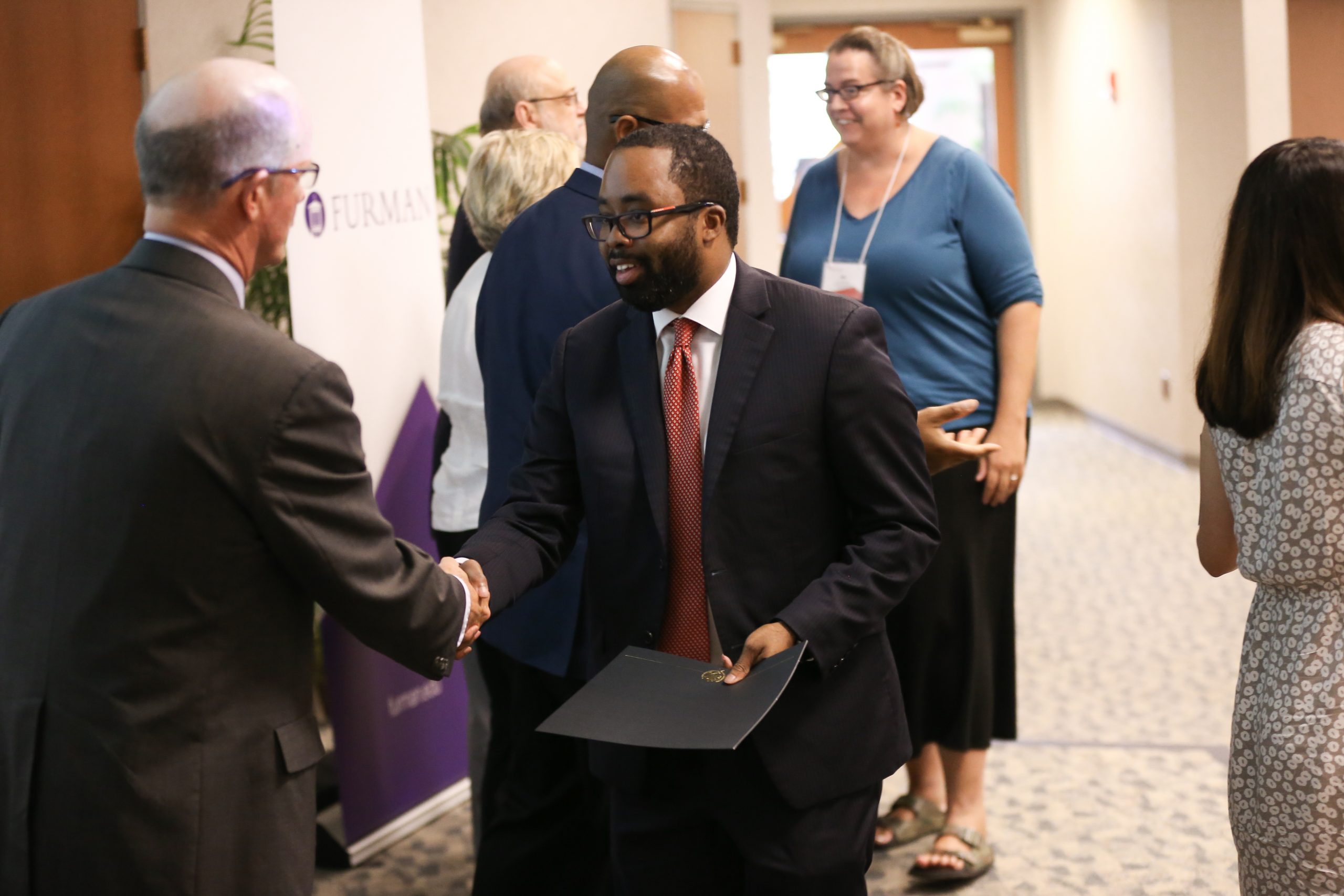 Mark McLawhorn, Flashes of Hope - Midlands, receiving his Riley Fellow certificate