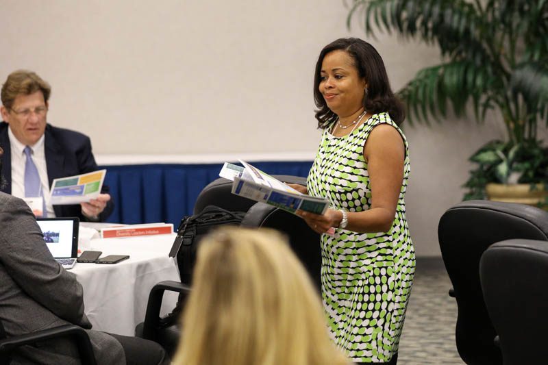 The Gap Busters: Karla Hawkins passing out information