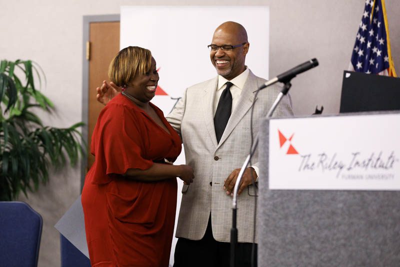 April Heyward, Career Motivators, receiving her Riley Fellow certificate from Juan Johnson
