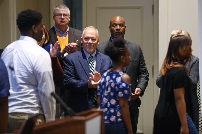 PW Chop team members applauding the Phillis Wheatley singers