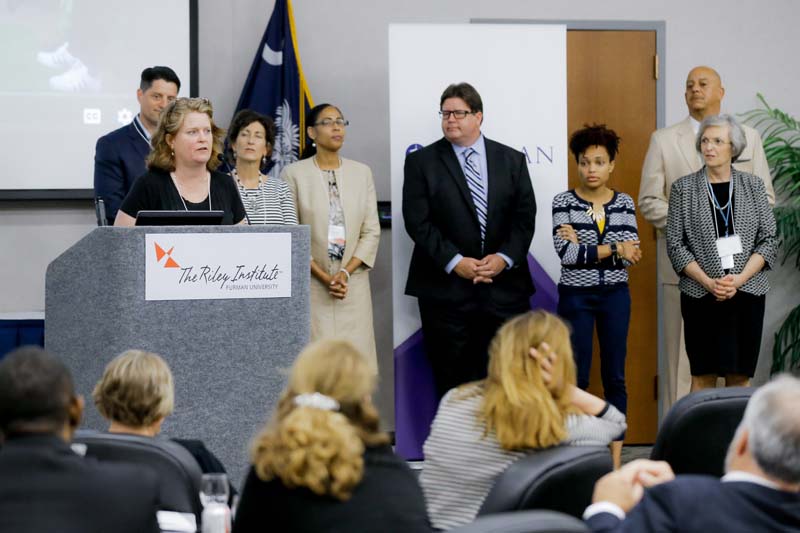 (l-r) Heather Sherwin speaking, Dave Solano, Cathy Jamieson, Tijuana Hudson, Dan Wuori, guest, Bobbi Kennedy, guest