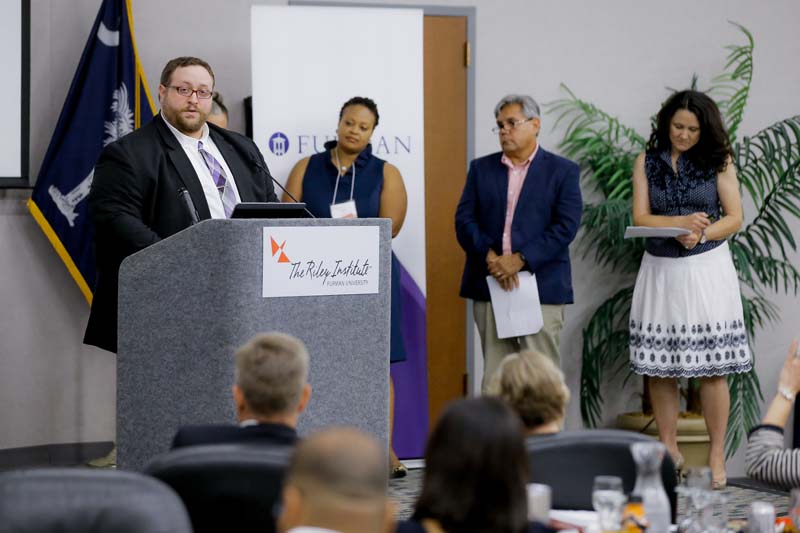 Eric Mollo speaking, Beth Ruffin, Robert Thomas and Debbie Elmore, Team Tapestry
