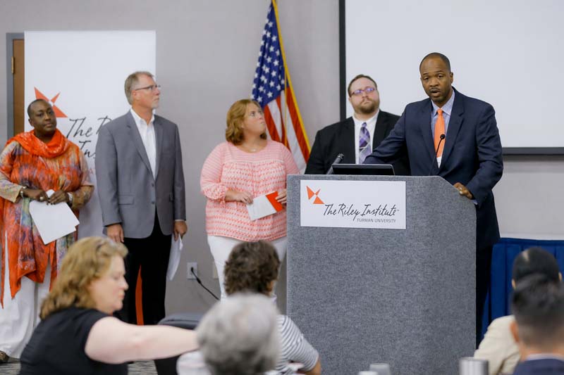 (l-r) Christine Crawford, Jim Shank, Lila Anna Sauls, Eric Mollo and Randall Gary speaking, Team Tapestry