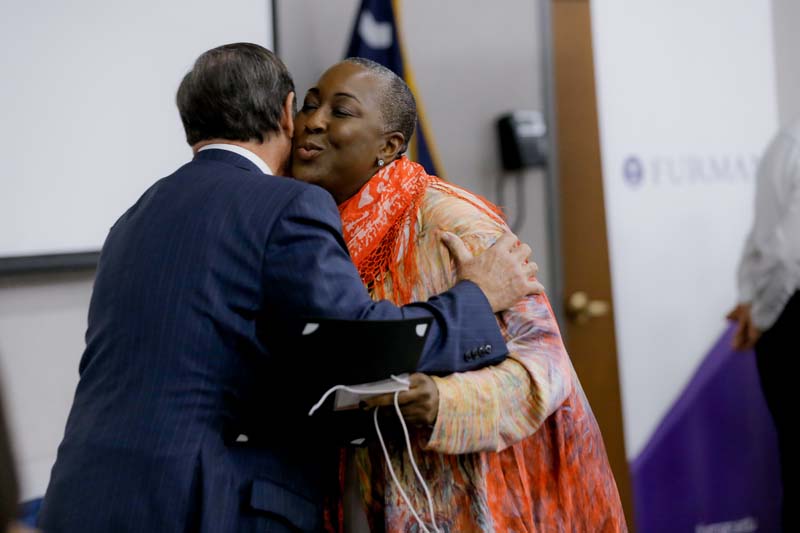 Riley Fellow Christine Crawford sharing a hug with Don Gordon