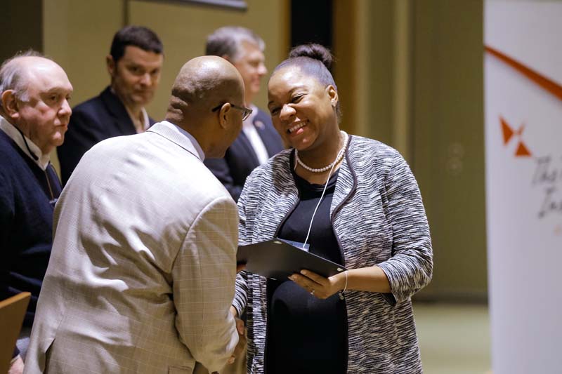 Natalie Ham, Music is the Medium, receiving her Riley Fellow certificate from Juan Johnson