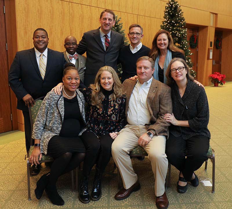 Music is the Medium team members Row 1 (l-r): Natalie Ham, Kecia Greenho, Ken Lott and Nancy Appel; Row 2 (l-r): David Bennett, Clifford Fulmore, Greg Bulanow, Gable Stubbs and Catherine Main