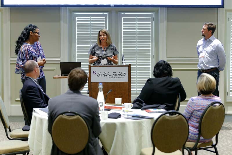 (l-r) Lakeia Harris, Katy Pugh Smith speaking and John Lattimore, SAFER