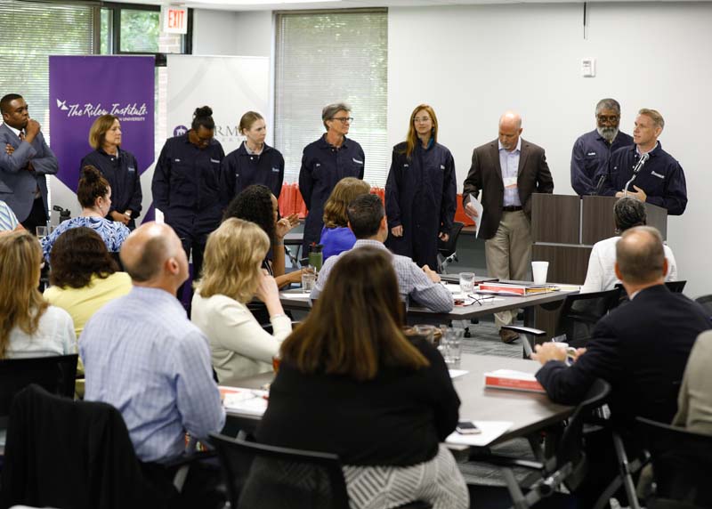 (l-r) Carl White, Della Watkins, Mary Sumter, Stephanie Wildrick, Betty Best, Georgia Mjartan, Sean Baird, Bob Reeder and Anthony Padgett speaking, Project Power Play