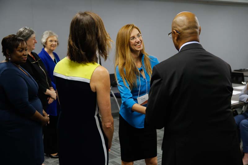 Georgia Mjartan, Project Power Play, receiving her Riley Fellow certificate from Juan Johnson