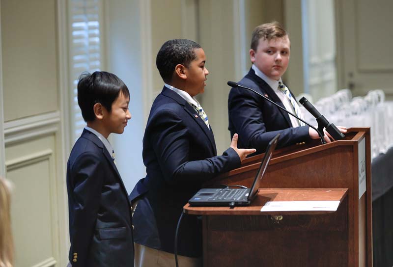 Students from Monaview Elementary School’s Men Who Read program, Leaders for Literacy