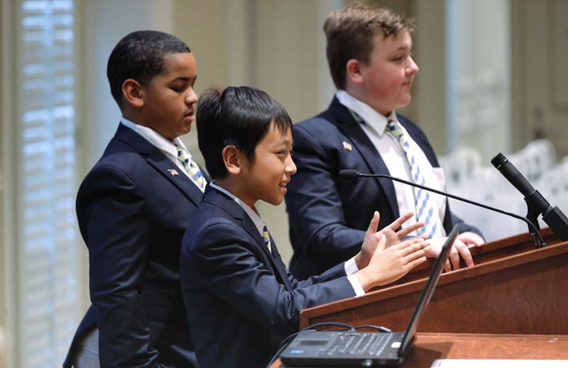 Students from Monaview Elementary School’s Men Who Read program, Leaders for Literacy