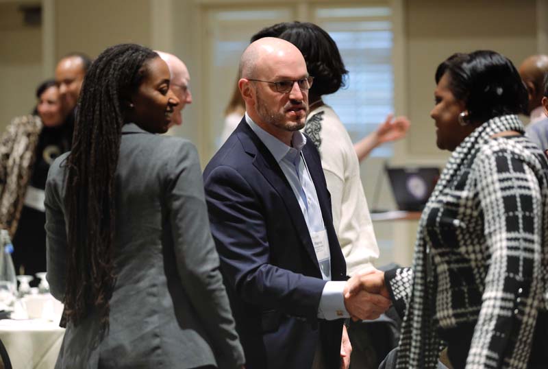 (l-r) Delia Allen and Patrick Springhart, R3, congratulating Latorrie Geer, Leaders for Literacy