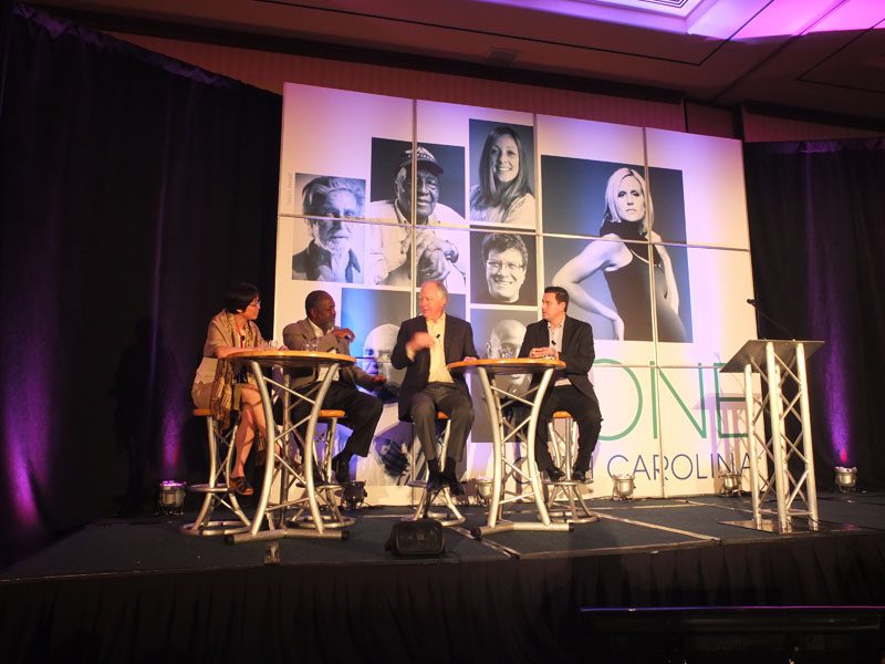The panelists (l-r): Carolyn Wong Simpkins, Roland Gardner, Ed Sellers and moderator Mark Quinn discussing 