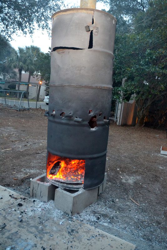 Rodney Scott burns a special blend of wood in this stove and uses the coals to cook the pork