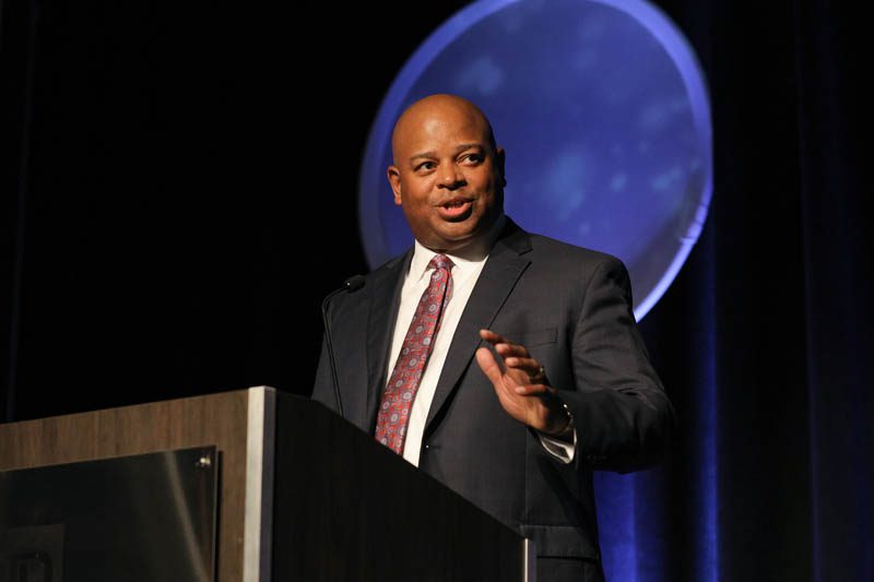 Carlos Phillips, the Greenville Chamber's President and CEO, and Riley Fellow from Upstate Class XXIII, making remarks