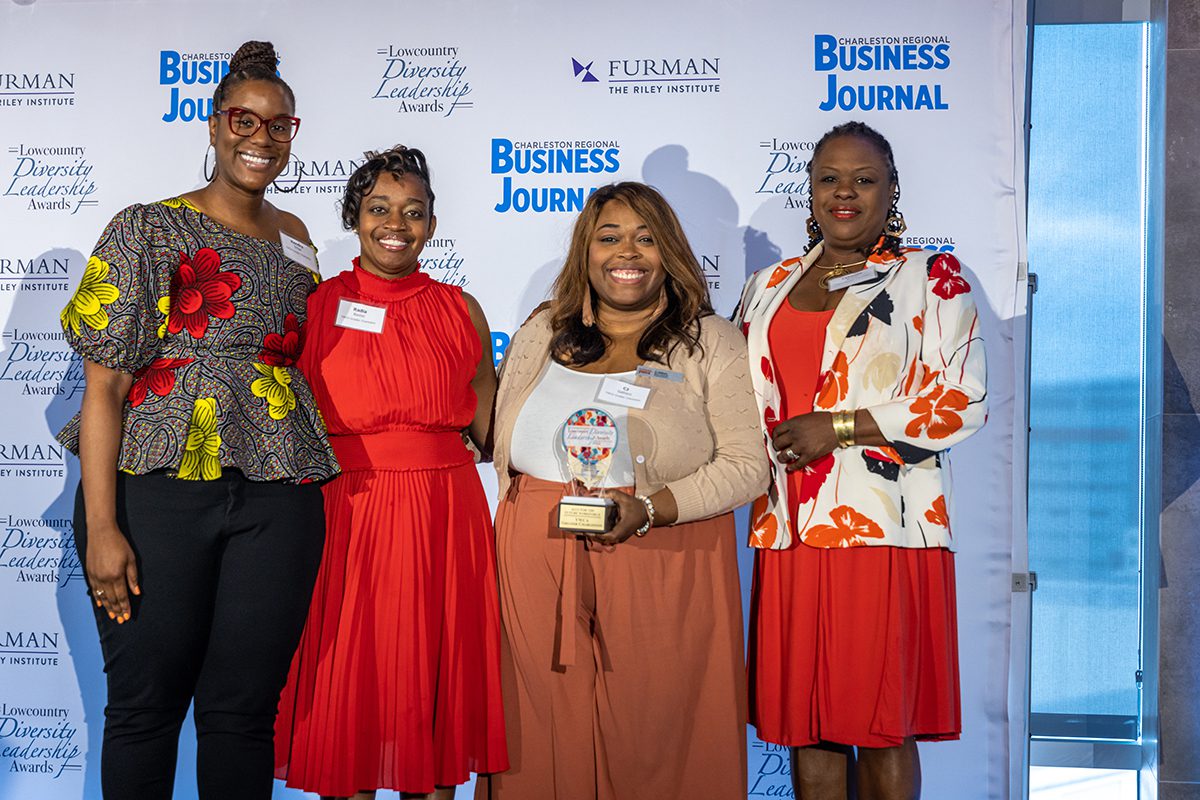 Staff members from the YWCA of Greater Charleston accept the Ally for the Future Workforce award