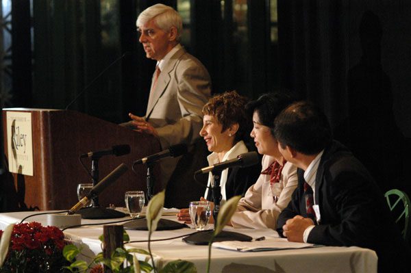 Albert Keidel moderating the panel discussion, 