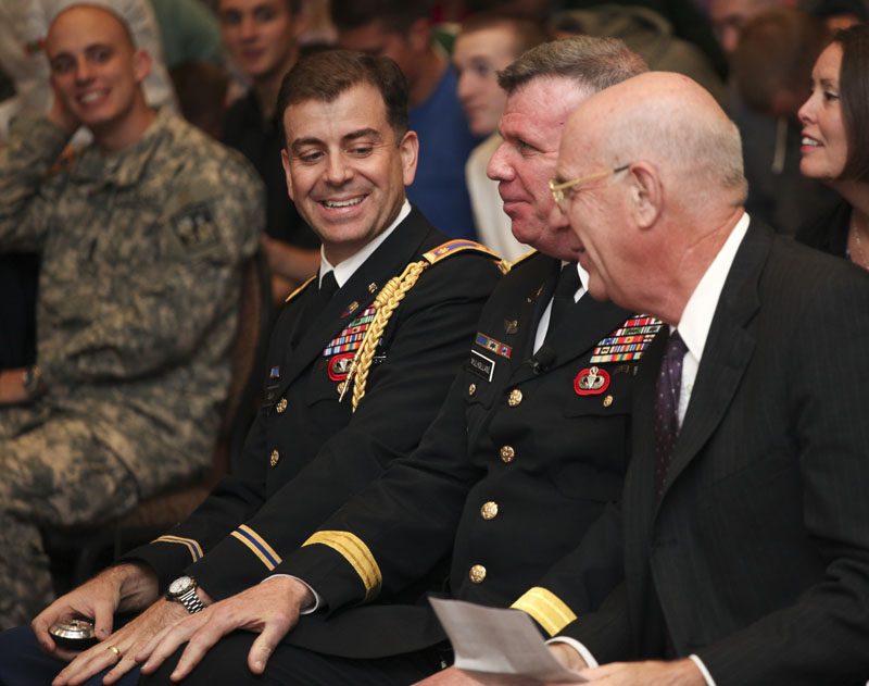 (l-r) Major Chris Black, General John Mulholland, Dr. Bill Lavery and General Mulholland's wife, Miriam behind him