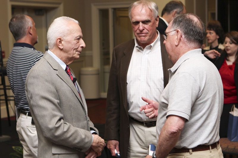 Richard Benedetto mingling with Sherm Rounsville, president of OLLI and other guests