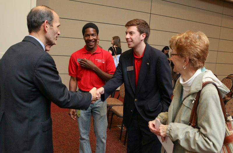 (l-r) Governor Baldacci, Advance Team members Kenny Palmer, Ben Saul and a community member