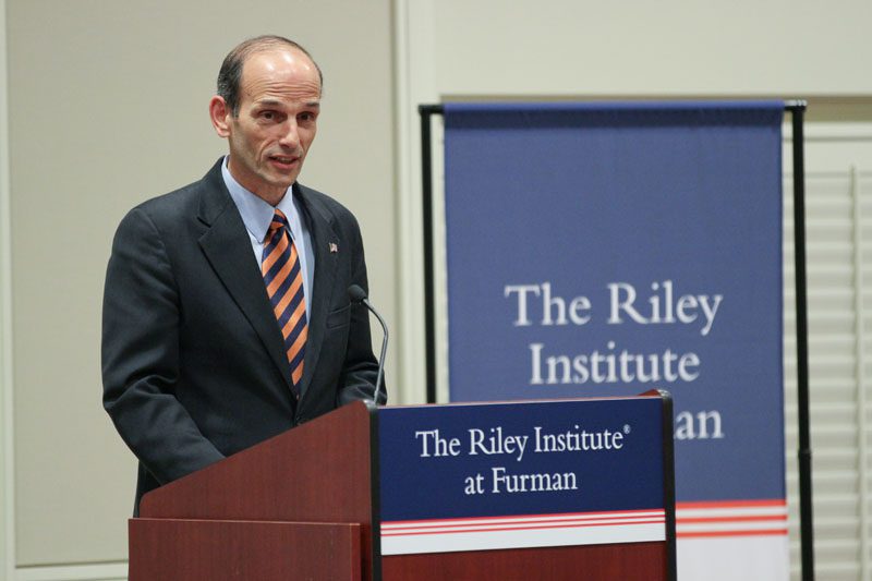 John Baldacci addressing the audience on 