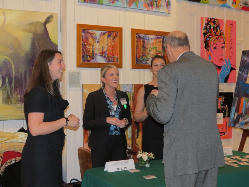 CLR members greeting guests and providing name tags at the reception