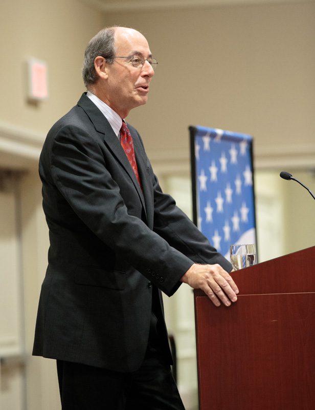 John Beckford, dean and vice president for Academic Affairs at Furman, welcoming all guests to Jeffrey Brown's address
