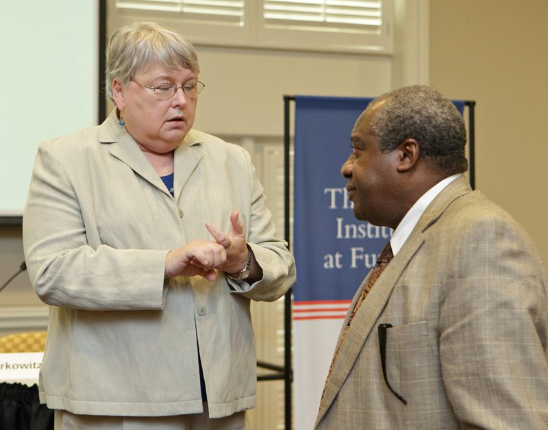 Lynn Bailey discussing the issues with a guest