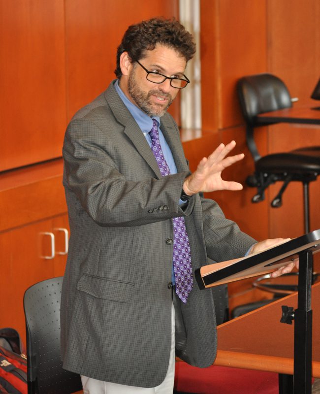 Erik Anderson, Professor of Philosophy, laying the groundwork for the upcoming discussion with General Lehnter