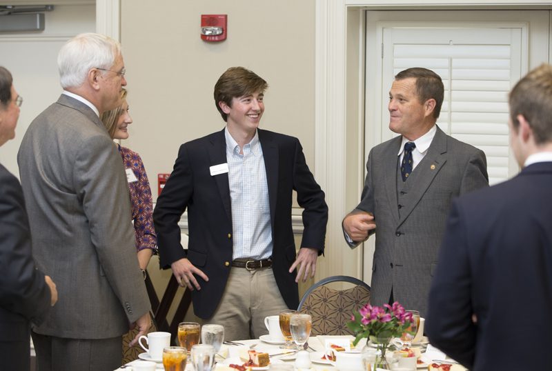 General Lehnert meeting students and President Korht, who will be sitting at the head table